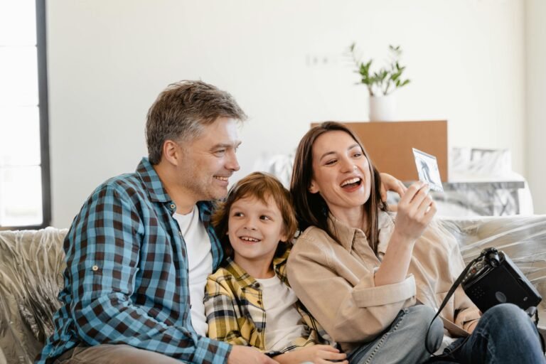 Happy family in front of new home – Alhambra good place to live for first-time homebuyers