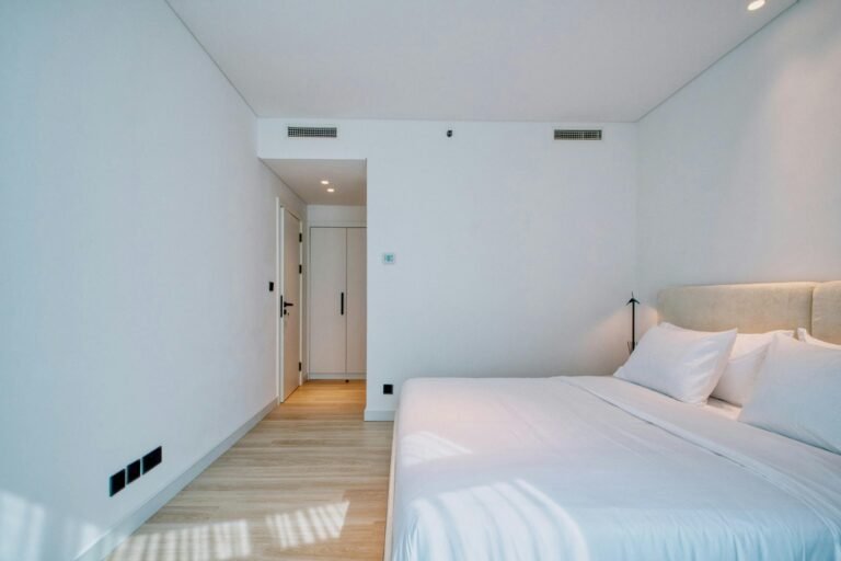 white room staged with a bed