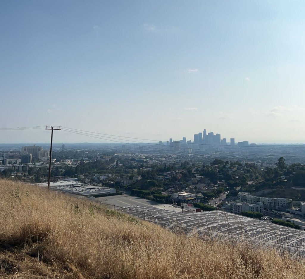 hill top view of LA from a dirt hike path in upper Arcadia
