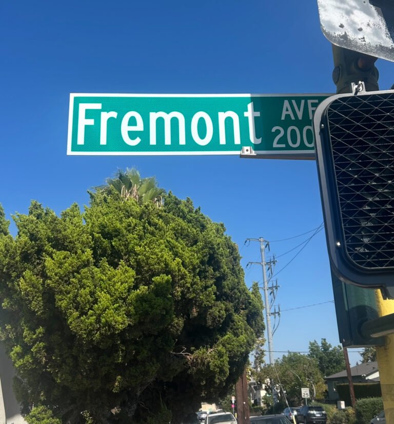 front picture of Fremont Ave street sign in Alhambra crosswalk