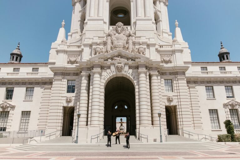 a small band playing in front of the Pasadena City Hall