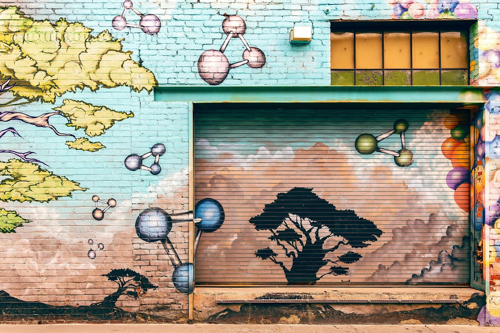 colorful art paintings on wall in Pasadena, city within the San Gabriel Valley